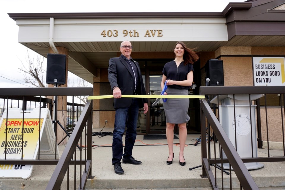    Mayor Roy Ludwig and Councillor Rebecca Foord, who is also the chair of the innovation council, cut the ribbon at the Southeast Innovation Business Development Centre. 