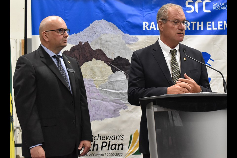 Saskatchewan Research Council President Mike Crabtree, right, answers questions from reporters while SRC Rare Earth Elements Division Associate Vice President Erin Herman looks on.