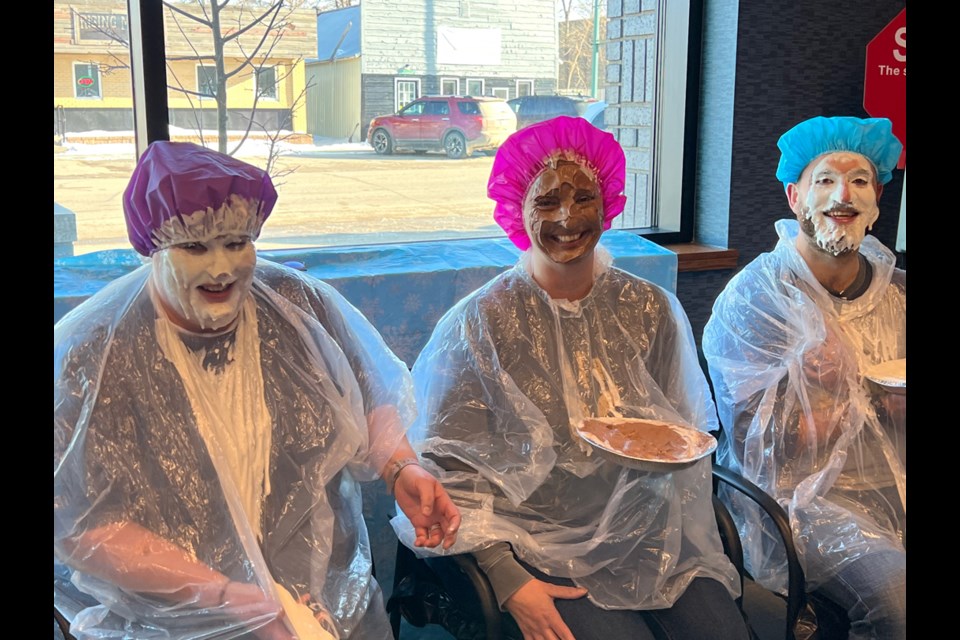 From left, loans manager Jolene Martin, general anager Christine Corscadden and Manager of Lending Derek Baumgartner from the Stoughton Credit Union were good sports about the pie tossing. 

