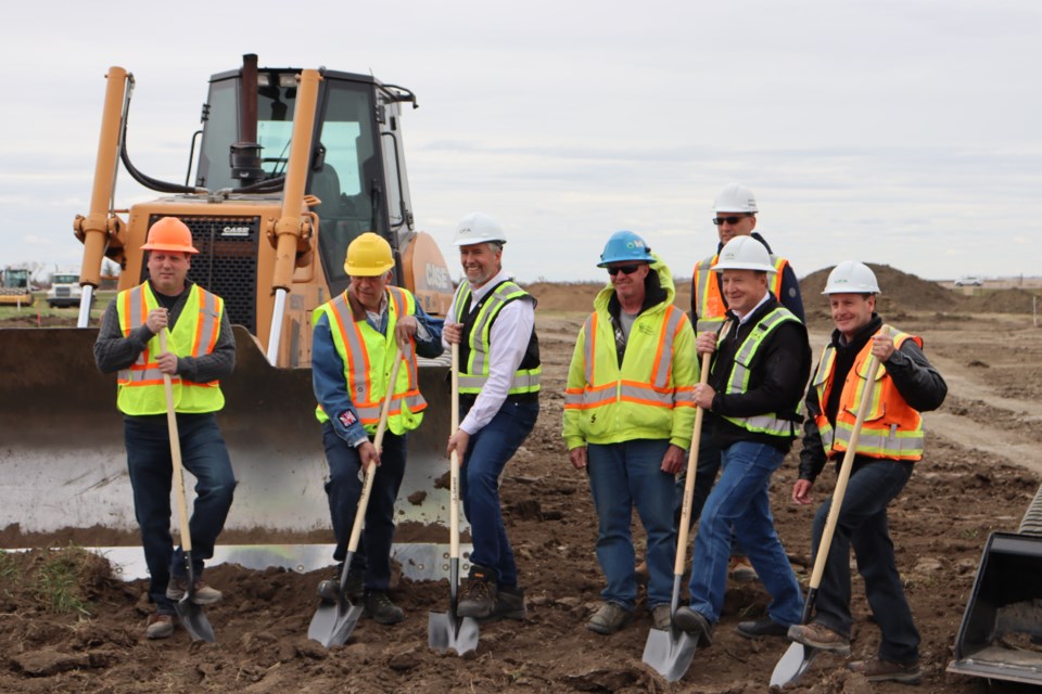 From left are Reeve Norm McFadden, Mayor Marcel Roy, Don Smith (VP Petroleum and Innovation, UFA), Steve Jenkins (Site Superintendent), Brian Le Haye (Project Manager for Capital Petroleum), Steve Marshall (Director Petroleum Operations, UFA), and Mike Hutchinson (Area Manager, UFA).
