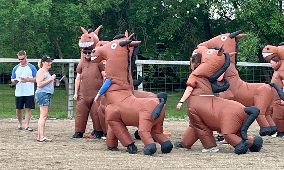 The horses, getting some last-minute instructions. 