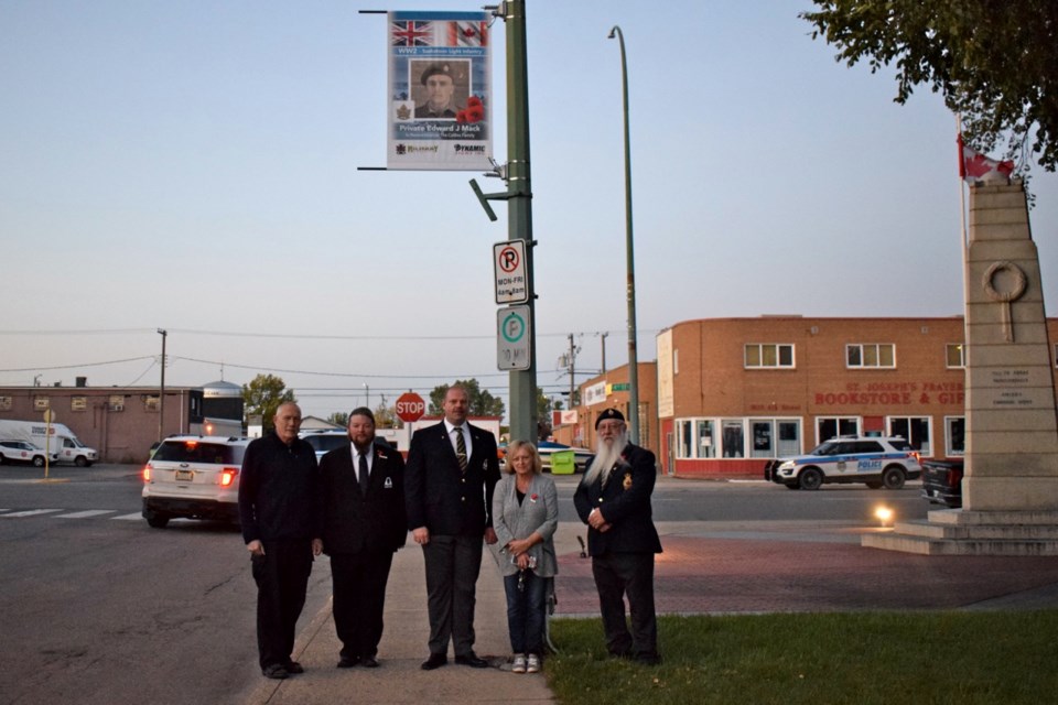 From left, Robert Rooks, Troy LeBlanc, Craig Bird, Marlys Collins and Jim (Forrest) Frosty partook in the official military banner reveal in Estevan. 