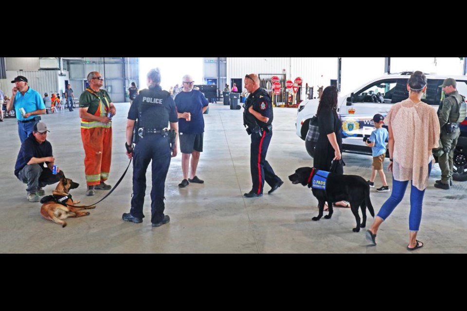 The Weyburn Police dog, Oakley, and the Victim Services dog, Beaumont, were both with their handlers meeting people at the City of Weyburn's open house in 2022.