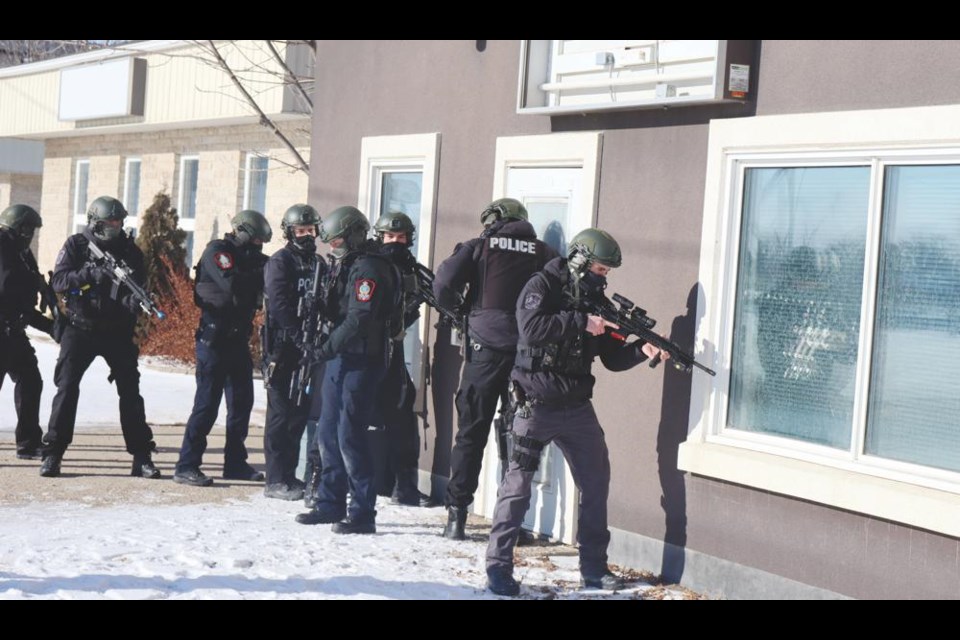 Officers from the Weyburn and Estevan Police Services engaged in tactical training in Weyburn, using an empty commercial building on Railway Avenue