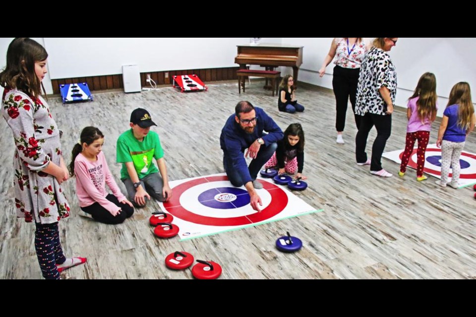 Two sheets of floor curling were set up on Saturday morning in the Allie Griffin auditorium of the Weyburn Public Library.