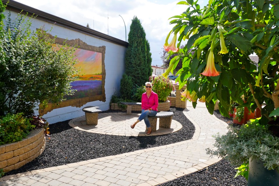 Gale Tytlandsvik has been working in the Garden on Fourth all summer to keep Estevan's beautiful downtown oasis blooming.                               