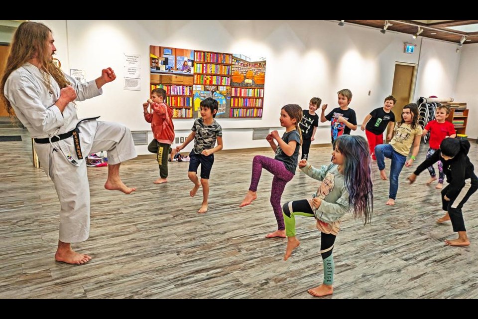 A recent program at the library was a karate demo for children, by sensei Owen Day (left) of Weyburn Wado Kai Karate club.