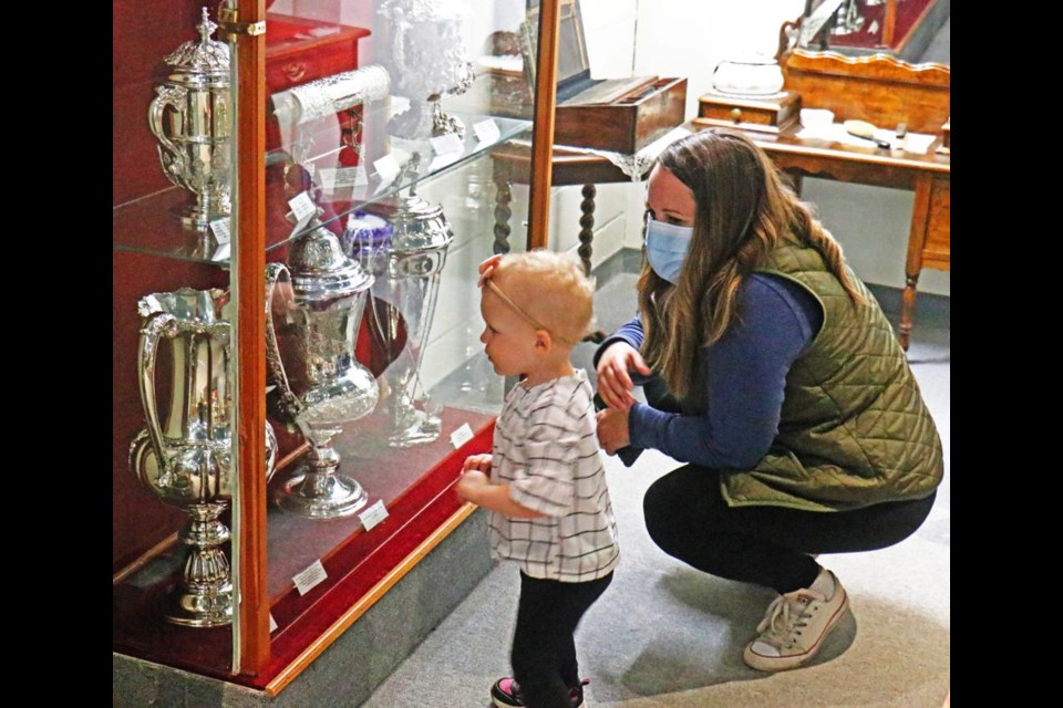 Paige Tenbult and her daughter Lily had a look at some of the items on display in the Charlie Wilson Silver Collection, in a guided tour held last year