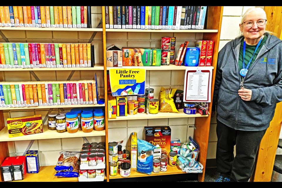 Librarian Dawn Silver shows the 'Little Free Pantry' available at the Weyburn Public Library, one of its 'secret services'.