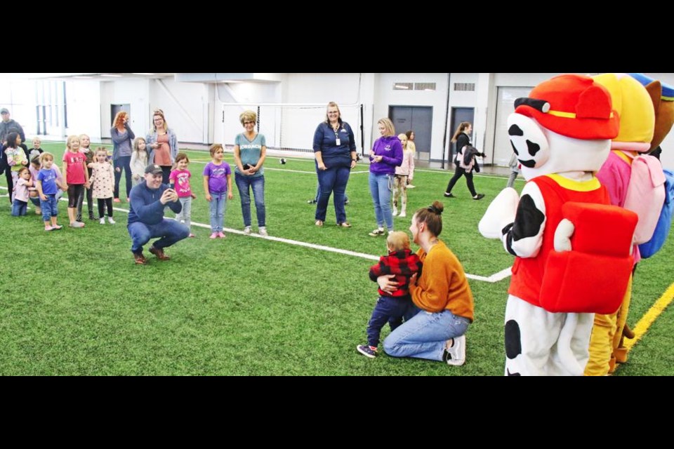 Families gathered on Mainil Field to meet visiting members of the Paw Patrol on Sunday afternoon, to mark the first anniversary of the CU Spark Centre.