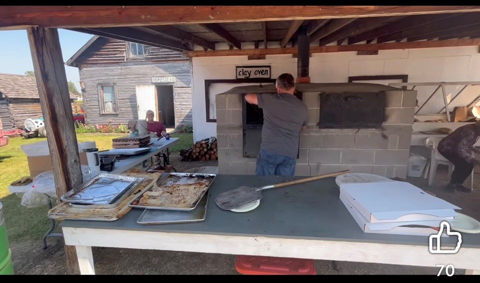 Freshly baked bread out of the clay oven can be purchased.