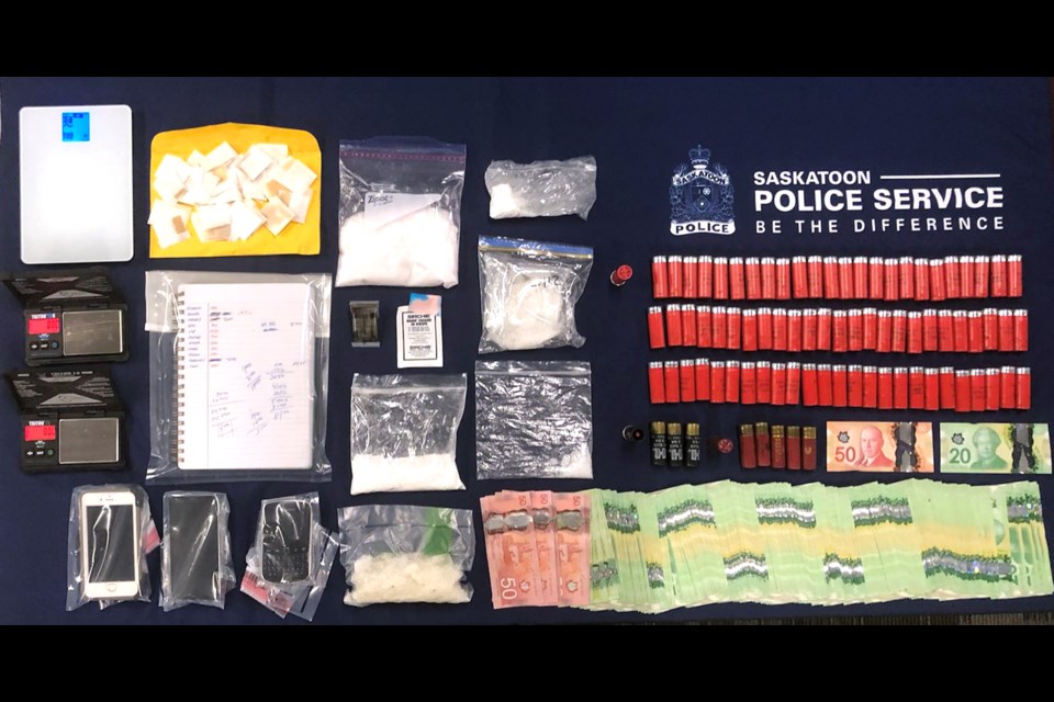 Saskatoon police seized 461.7 grams of methamphetamine, 31.1 grams of cocaine, 174.1 grams of cocaine/meth mixture, $7,690 in cash, 40 packages of cannabis extracts, shotgun ammunition, as well as cell phones, and digital scales.