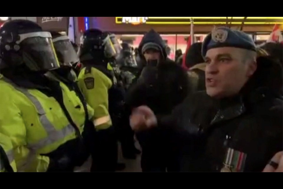 A Canadian Forces vet who served in Bosnia shames police who tear gassed peaceful protesters in Ottawa in February. The unidentified vet can be heard hollering at the police "Why did you shoot tear gas? Because we couldn't run fast enough?" The vet said he was protecting a line of thousands of protesters and it takes time for them to back up, which they were peacefully doing when they were tear gassed. "I didn't even do that in Bosnia," he yelled at the police officers. "Shame on you guys. You should be [expletive] ashamed of yourself." 