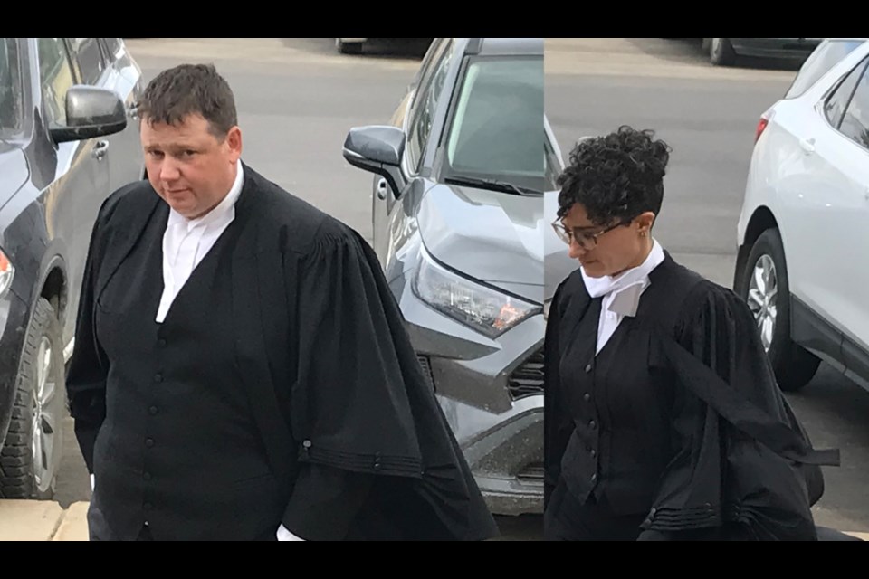 Prosecutors, Senior Crown Chris Browne and Charlotte Morden entering Battleford Court of King's Bench.