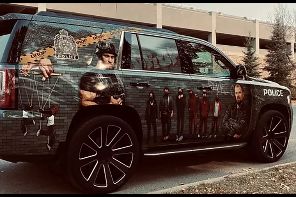 The $70,000 Drop Gangs vehicle is covered with illustrations that depict the negative consequences of gang involvement.