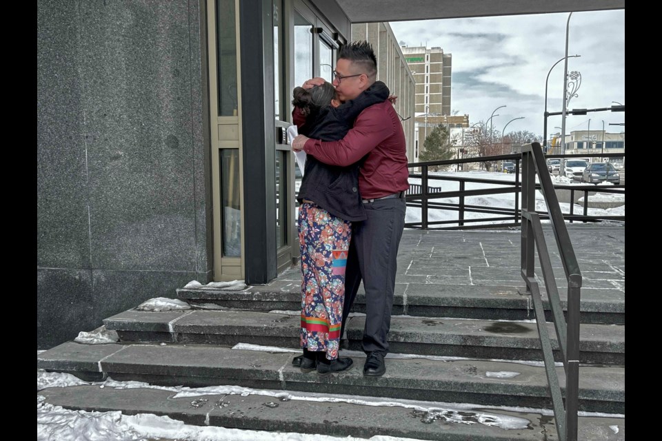 Catlin Goodwill embraces his mother, Nadine Goodwill, moments after being found not guilty of manslaughter in the death of his son.  