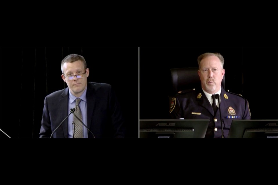  Lawyer Rob Kittredge from the Justice Centre for Constitutional Freedoms (left) questions Ottawa Police Service Superintendent Robert Bernier at the inquiry on Wednesday. 