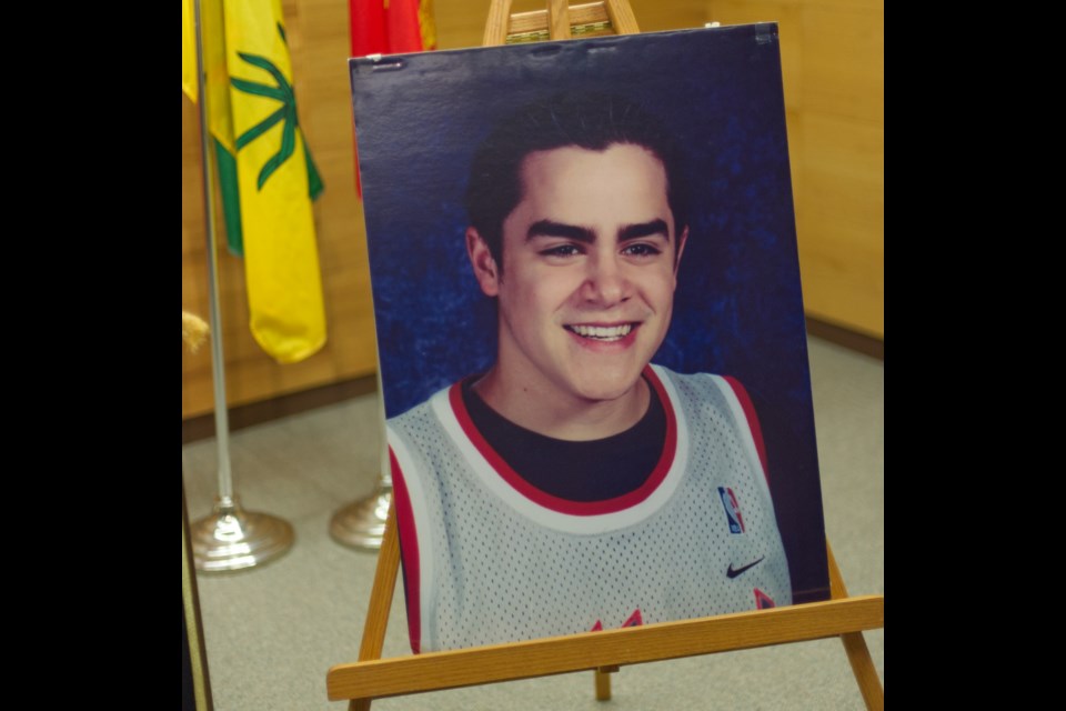 A photo of Misha Pavelick was on display during the news conference on June 27.