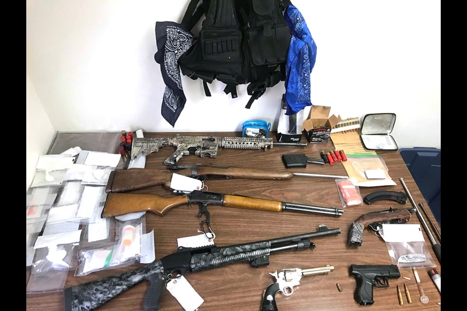 On March 6, Spiritwood RCMP located two suspicious vehicles outside a home on Witchekan Lake First Nation. As a result of their investigation, a search warrant was executed on the home. Police seized seven firearms, three prohibited weapons, approximately 32.5 grams of suspected crack cocaine, 23.5 grams of suspected methamphetamine, 105 grams of an unknown substance under investigation, drug trafficking paraphernalia, and a sum of cash. 