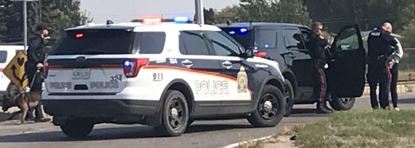 Saskatoon Police Service (SPS) conducted a high-risk traffic stop Saturday at the corner of Circle and Laurier Drive. They arrested three people and seized weapons.