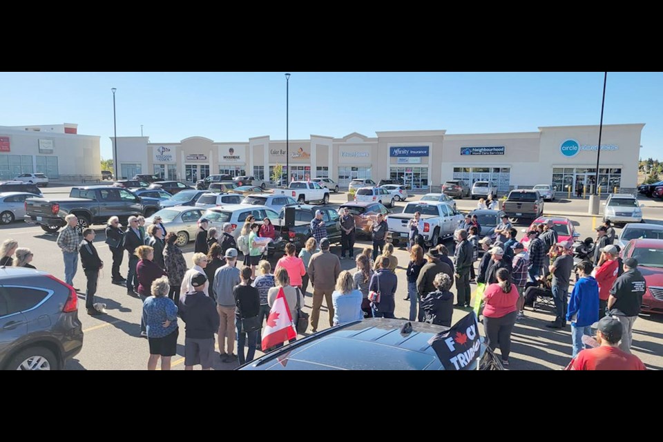 A vigil was held for Carol Pearce's family on Saturday in Saskatoon. Pearce died seven minutes after receiving the COVID-19 booster shot and her family believes that killed her. 