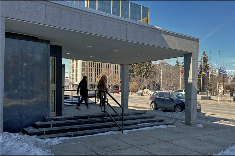 Chelsea Whitby (right) exits court on March 29.