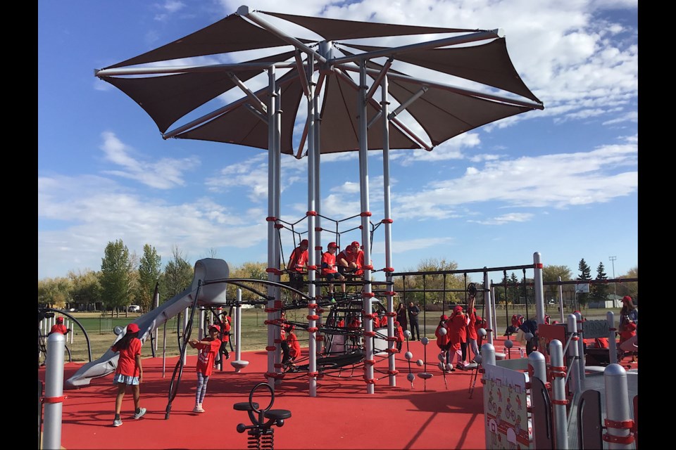 The scene in the Glencairn neighbourhood of Regina as a new inclusive playground and spray pad is open.