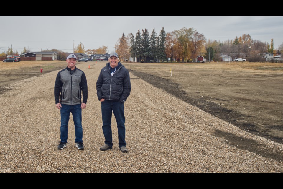 Town of Mossbank CAO Chris Costley (left) and Mayor Bryan Howe stand at the Centennial Drive extension.