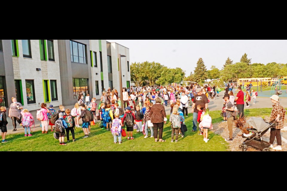Legacy Park Elementary School, shown here on its first day of class, comprises part of the stats looked at in the Cornerstone board's wall walk of data.