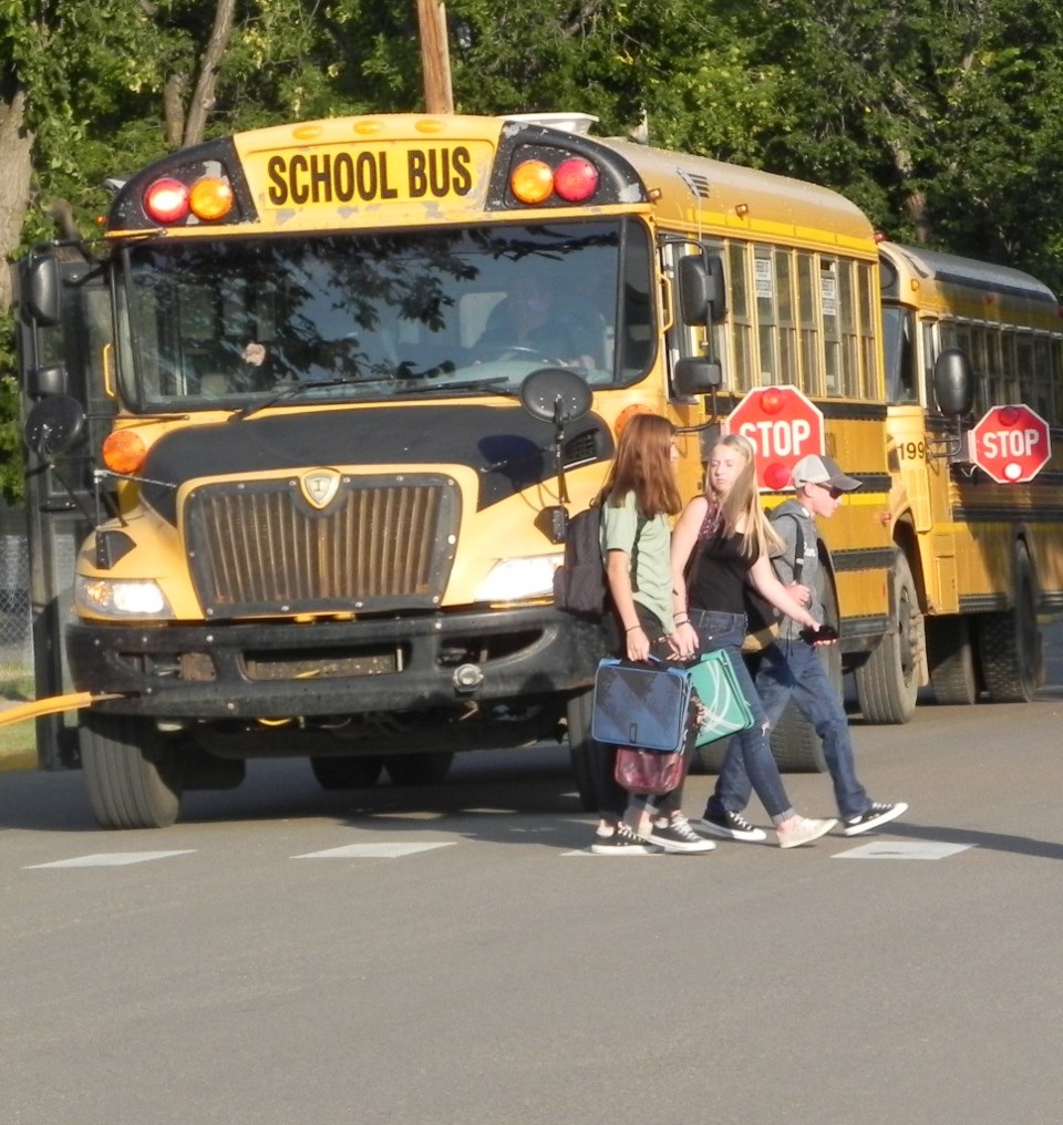 3 kids to UPS off bus resize