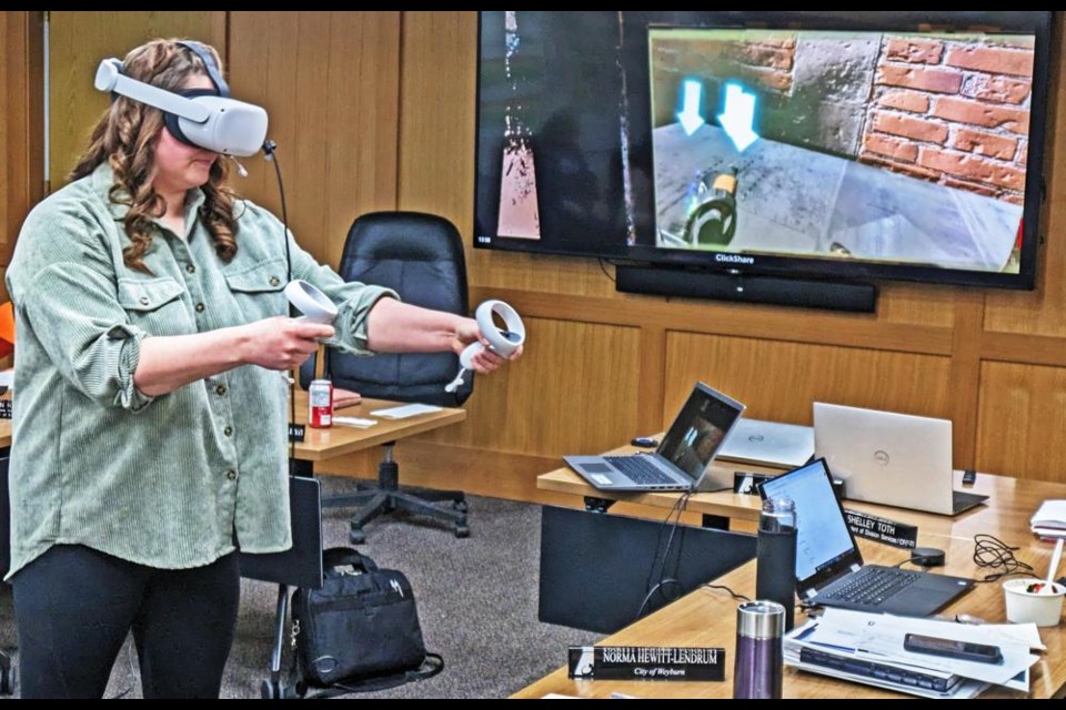 Megan Schick, a trustee for Weyburn on the Southeast Cornerstone School board, tried out the virtual reality program for welding as a demonstration for the board on Wednesday. This was part of a presentation to the board which updated trustees on curriculum and instructional technology used in Cornerstone schools.
