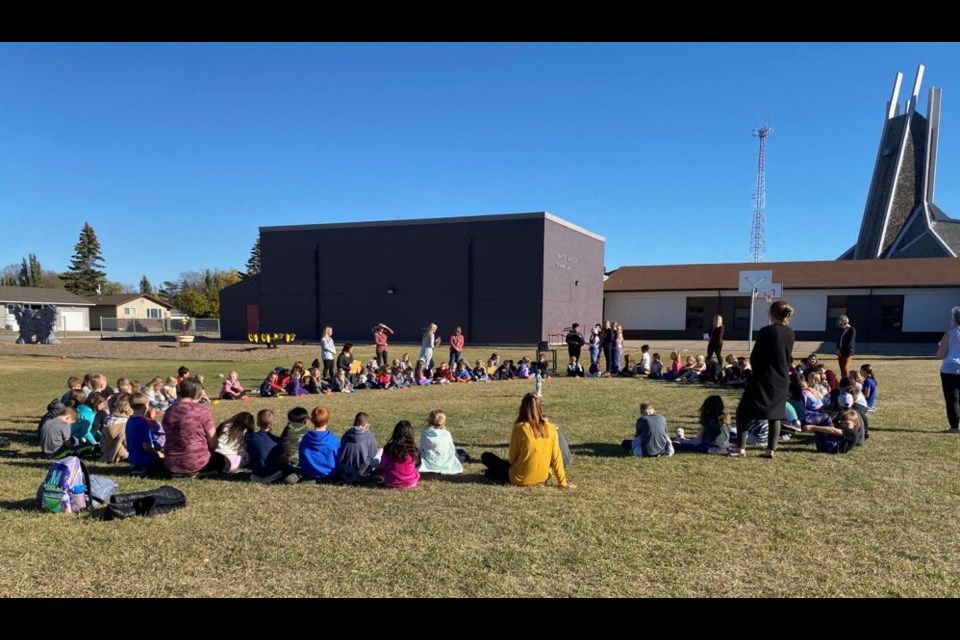 Education week activity began at St. Peter's School in Unity with an outdoor participation in living rosary.