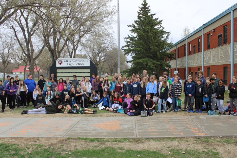 Students from Unity Public School, St. Peter's School and Unity Composite High School join together for a photo as part of one of the Activate events.