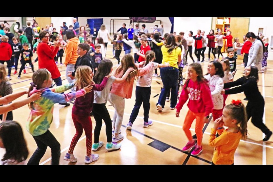 Some long conga lines formed during the school dance at Assiniboia Park on Friday afternoon.