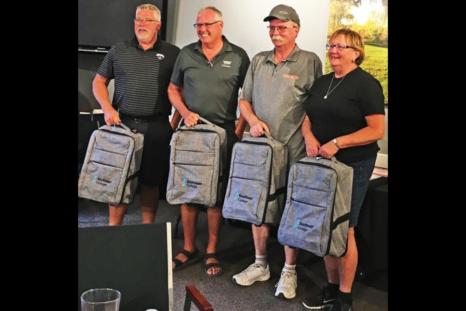 The tournament winners for Southeast College's Swing for Scholarships golf tourney was from Barber Motors, including from left, Russ Chartrand; Jerome Sidloski; Rod Smith, and Cindy Mack.