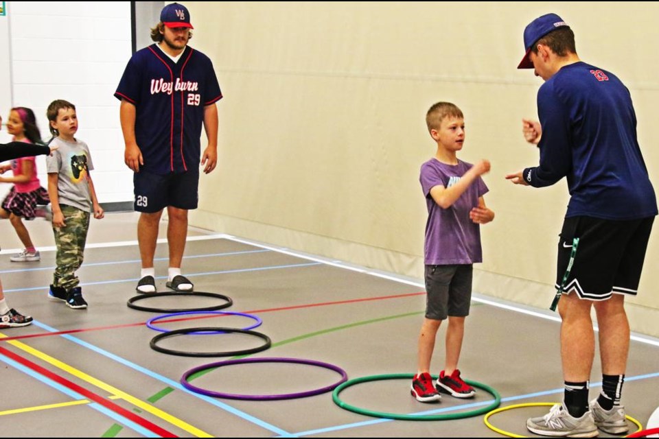Weyburn Beavers players took part in a fun relay race with a Grade 2 class in Phys.Ed class on Friday at Legacy Park school.