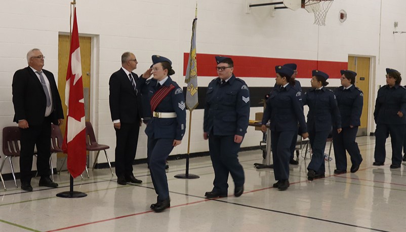 With F/Sgt and Cadet Parade Commander Maisie Kuzminski leading the way, the Canora Air Cadets marched past the viewing stand occupied by Richard Petrowski, the Saskatchewan executive director of the Air Cadet League of Canada (left), and Reviewing Officer Mark  Ochitwa at the Annual Ceremonial Review on June 4.