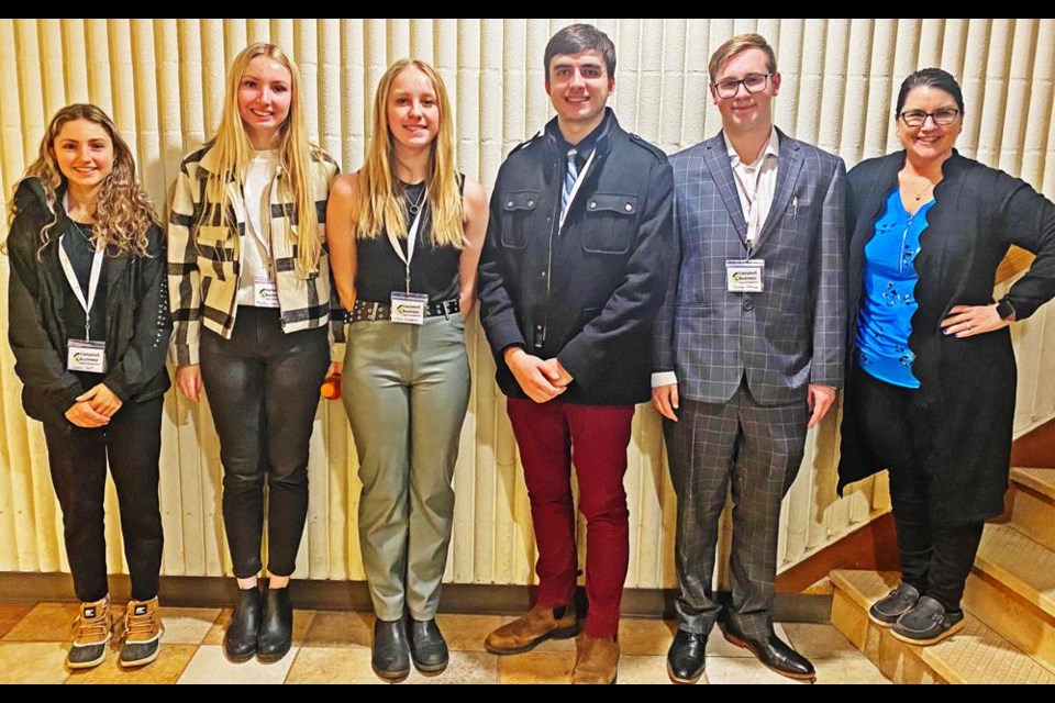 The Weyburn Comprehensive School’s team in the Campbell Business High School Case Competition gathered at the University of Regina’s Paul J. Hill Business School on Friday. From left are Josee Hutt, Maddie Gerry, Nikola Erasmus, Dalton Molnar and George Hoffman, and teacher Margot Arnold. Missing was Ella Leko. The team of Erasmus, Molnar and Hoffman won second place out of nine personal finance teams competing.