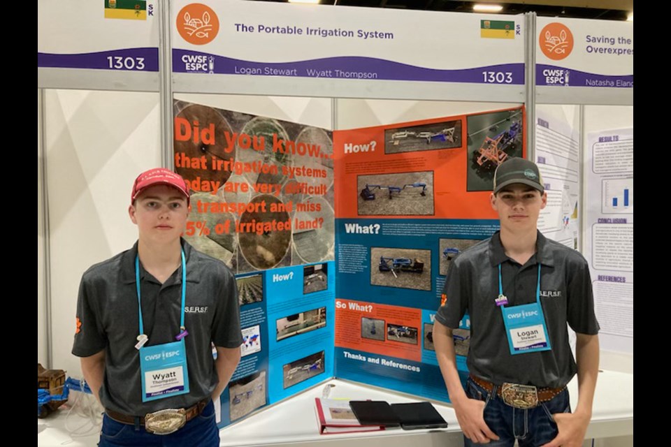 Wyatt Thompson, left, and Logan Stewart at the national science fair. 