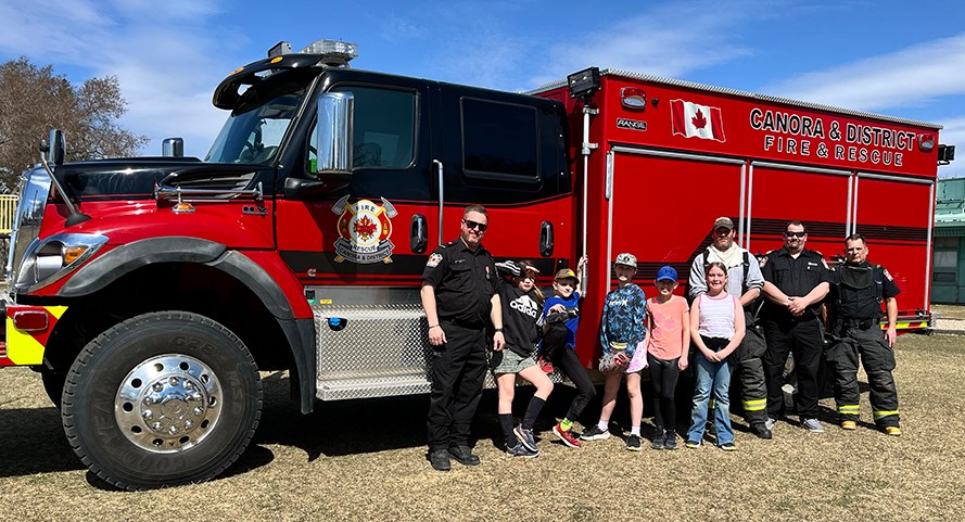 The Canora Fire Department members arrived in their fire truck and gave students a tour, of both the inside and the outside. Local fire fighters also showed students the different types of equipment they use and the gear they wear to fight fires. 