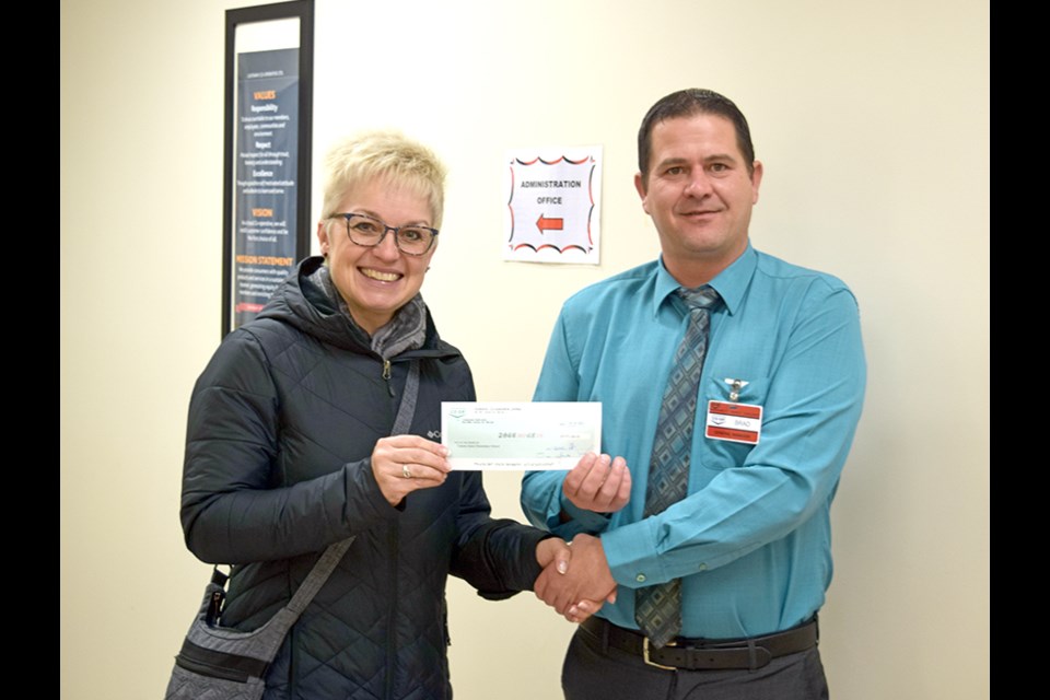 On Nov. 14, Gateway Co-op General Manager Brad Chambers presented a cheque for $2,865.65 to Canora Junior Elementary School Principal Shawna Stangel. The funds were raised during Co-op Fuel Good Day in September, including burger sales, and are in support of the CJES outdoor classroom and swing project.