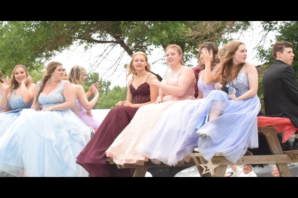 Students donned their finest attire for the grad parade. 