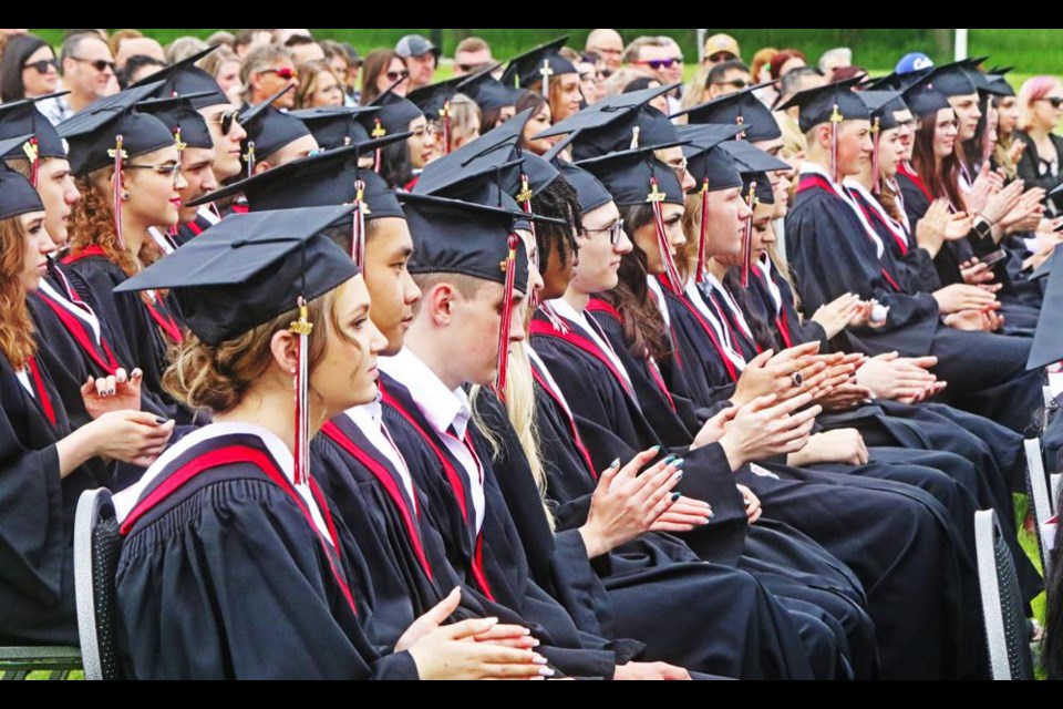 Once the grads were seated, each one was called up to be introduced, with a brief comment about their plans after graduation