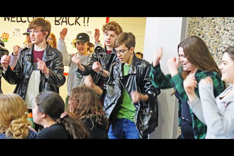 The gang from "Grease" were part of the flash mob at the Weyburn Comp on Wednesday