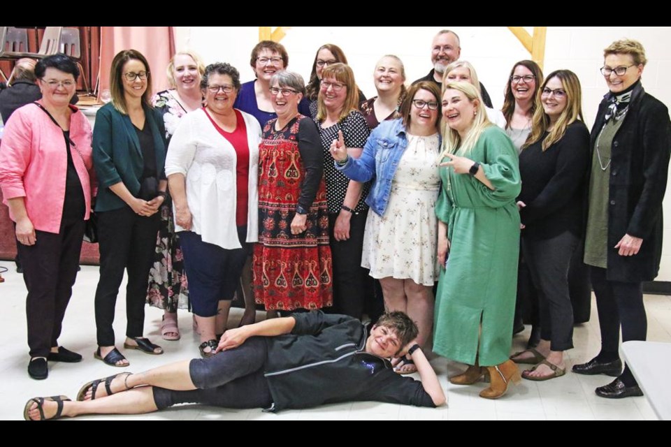 Some of the award recipients of service awards from Holy Family School Division gathered for a group photo at the ceremony held on Friday evening.