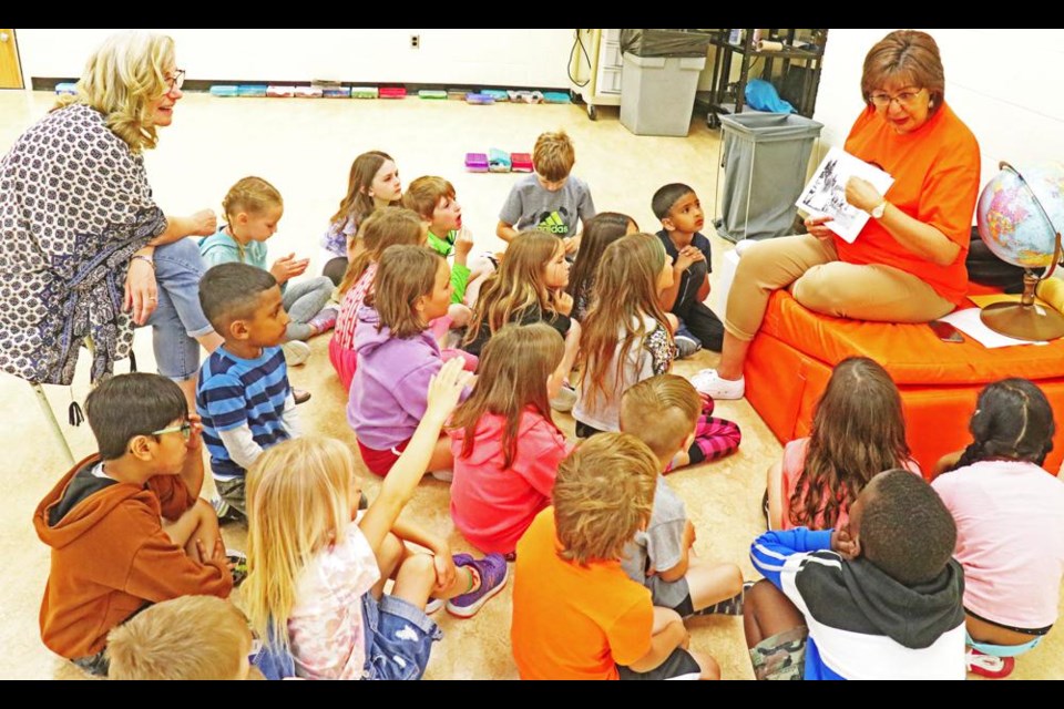Grade 1 students listened to storyteller Autumn Baptiste, as she shared a tale as part of Indigenous Culture Day on Friday at St. Michael School.