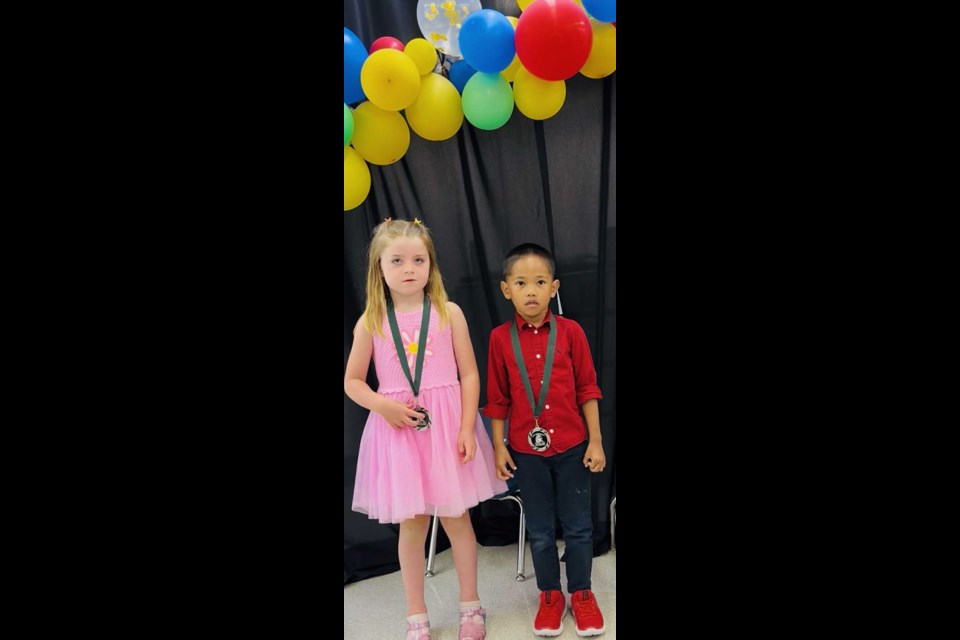 Invermay celebrated Kindergrad on June 24. Teacher Lily Lozinski congratulated Jane Dubas, Kian Ferenal, Sadie Genoway (absent from photo)  and Addilynn Maracle (absent from photo) upon their graduation from kindergarten. 