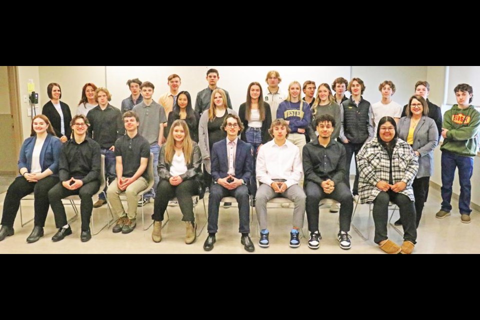 The Weyburn Comp’s Junior Achievement company, Sweets and Treats Co., gathered after holding their final board meeting of the first semester, where they reported on a very profitable year. In the back row from left are business mentors Monica Osbown, Weyburn Chamber manager, and Andria Brady of Community Futures Sunrise; Jeremy Symes, Asher Knox, Franz Unger, Owen Istace, Carter Gervais, Ryder Fellner, Jack Kradovill, Calder Brown and Vann Dennis. In the middle row are Mitchell Fister, Kail Kater, Nicole Malana, Allison Demchynski, Kaedee Schultz, Taya Schmidt, Sophia Jordens, Silas Stein and WCS business ed teacher Margot Arnold. In front are Shayna Gosling, Brasen Sim, Wylie Kopec, Jenna Knupp, Hudson Bourassa, Keaton Husband, Isaiah Sanderson and Ryanna Sidloski.