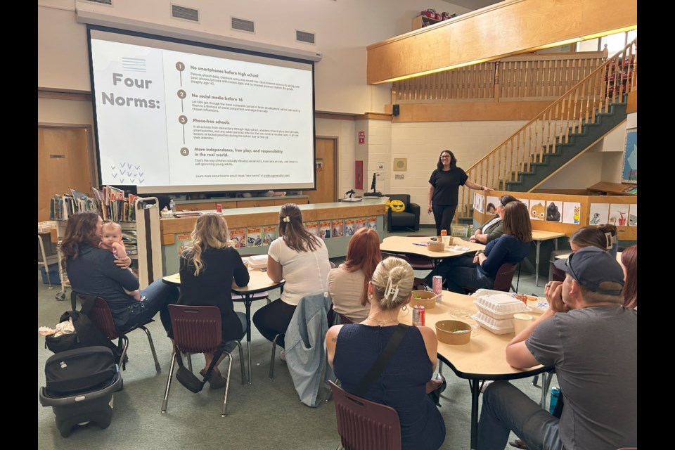 Just under two dozen people participated in a Lunch and Learn event held in June at 7th Avenue School highlighting how technology is contributing to an anxious generation.