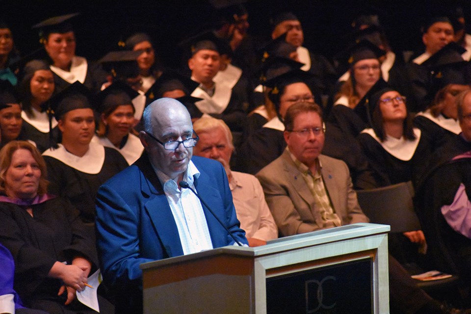 Keynote speaker Rob Rongve speaks to graduates.